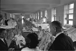 President Lyndon B. Johnson visits injured servicemen returned from Vietnam