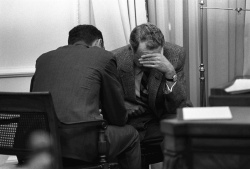 President Lyndon B. Johnson and members of his staff react to the news of Martin Luther King Jr.'s assassination